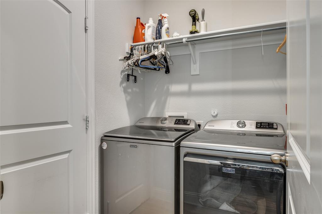 8413 Alba Lane Rowlett, TX 75089 - Photo 22 of 25 a utility room with dryer and washer