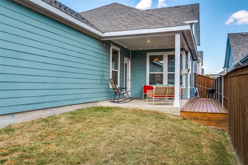 8413 Alba Lane Rowlett, TX 75089 - Photo 25 of 25 a view of a house with a patio and wooden fence