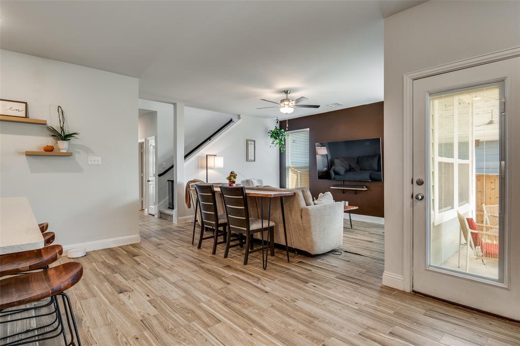 8413 Alba Lane Rowlett, TX 75089 - Photo 7 of 25 a living room with furniture and a wooden floor