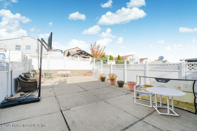 25 Berry Avenue West Staten Island, NY 10312 - Photo 24 of 24 a view of a terrace with furniture and city view