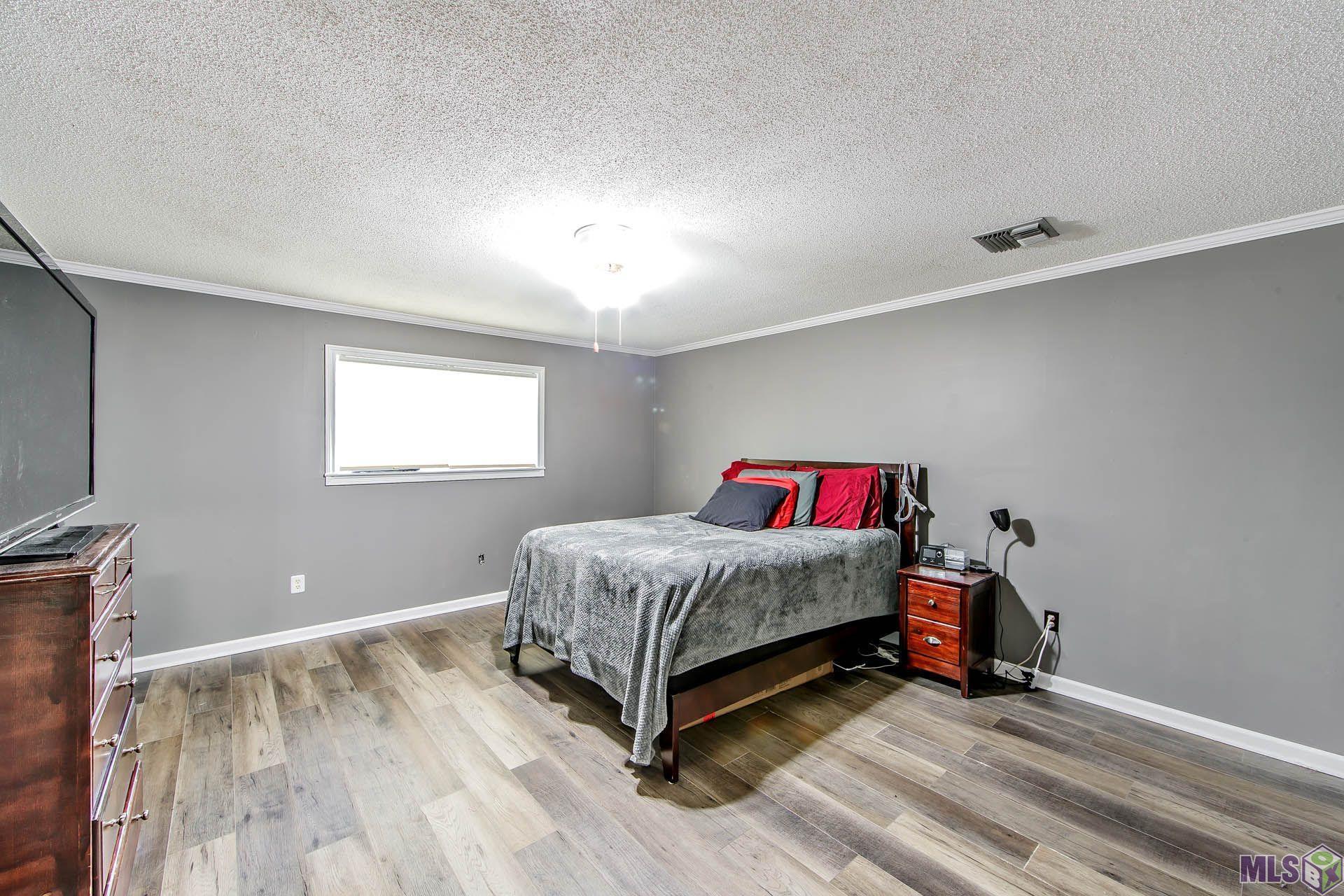 213 Hogan Street Berwick, LA 70342 - Photo 5 of 13 Primary bedroom