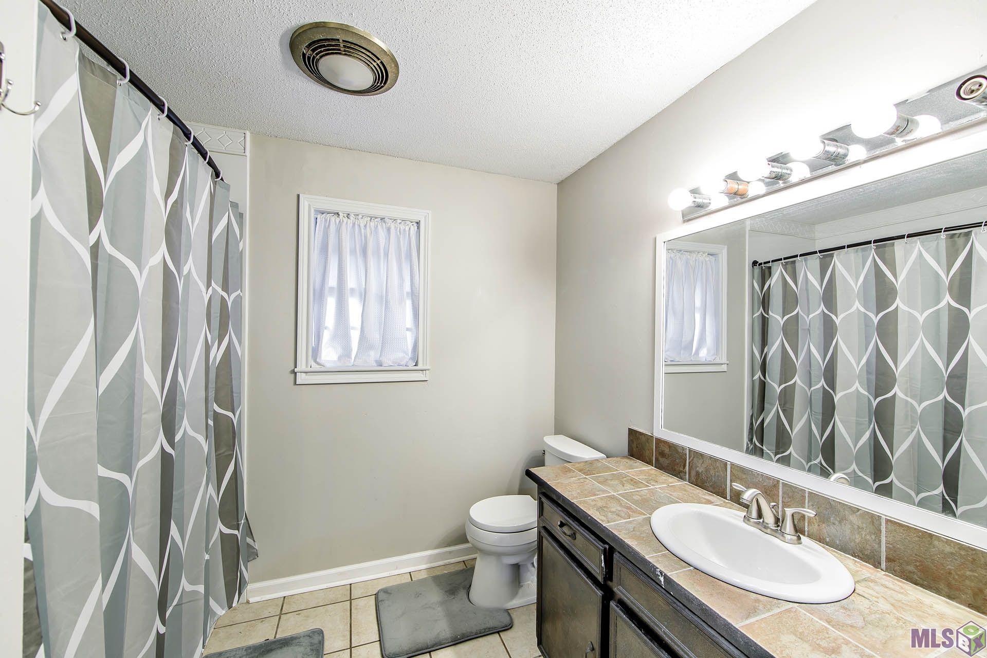 213 Hogan Street Berwick, LA 70342 - Photo 8 of 13 Bathroom