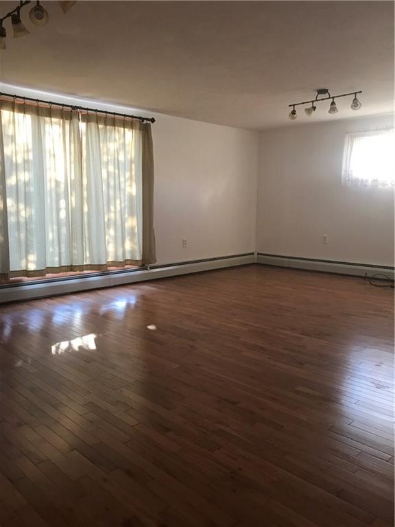 134 Atlantic Road New Derry, PA 15671 - Photo 3 of 9 Spacious Family Room with Hard Wood Flooring