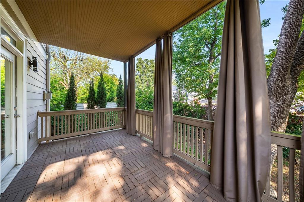 911 Monroe Circle Northeast Atlanta, GA 30308 - Photo 26 of 86 a view of a porch with a yard