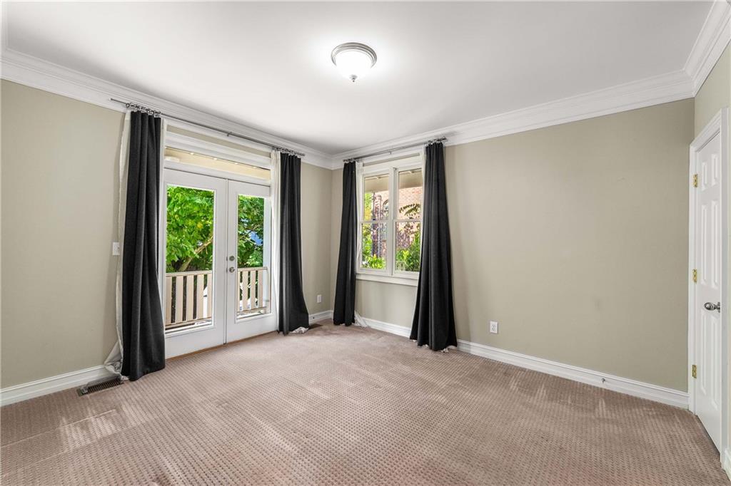 911 Monroe Circle Northeast Atlanta, GA 30308 - Photo 28 of 86 a view of a room with a large window