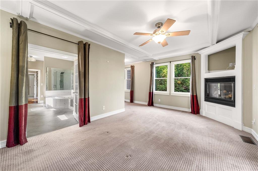 911 Monroe Circle Northeast Atlanta, GA 30308 - Photo 34 of 86 a view of a livingroom with a ceiling fan and window