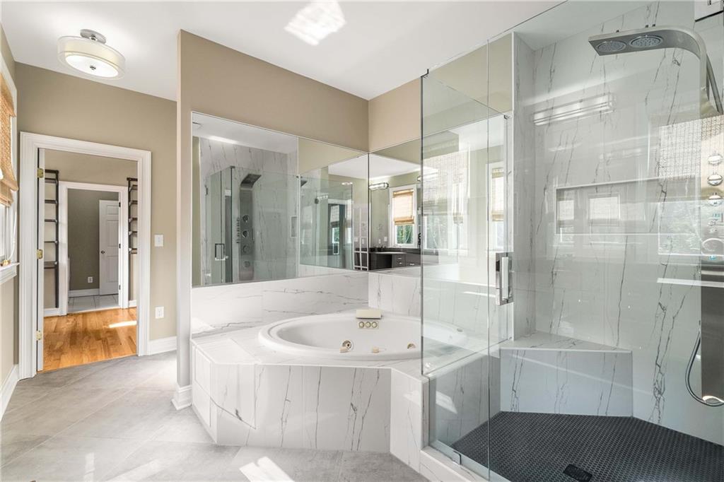 911 Monroe Circle Northeast Atlanta, GA 30308 - Photo 36 of 86 a bathroom with a tub shower and sink