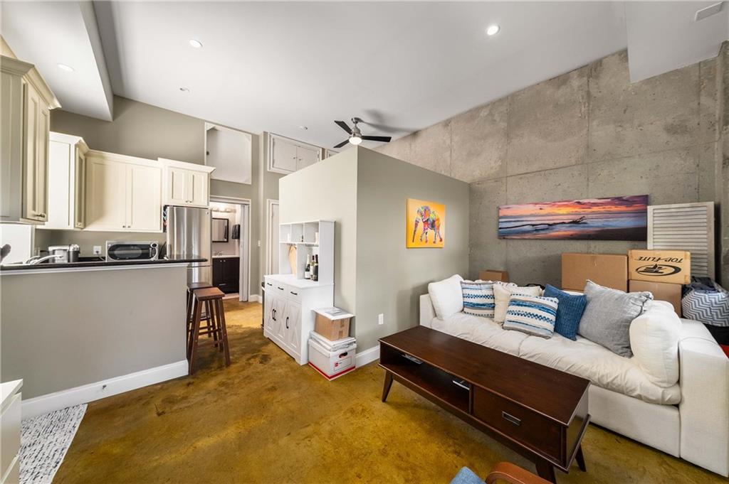 911 Monroe Circle Northeast Atlanta, GA 30308 - Photo 40 of 86 a bedroom with furniture and a couch