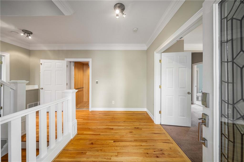 911 Monroe Circle Northeast Atlanta, GA 30308 - Photo 5 of 86 a view of a hallway
