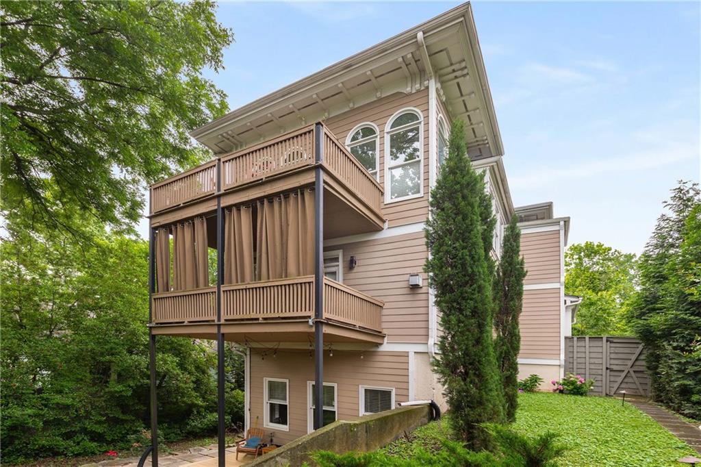 911 Monroe Circle Northeast Atlanta, GA 30308 - Photo 58 of 86 a view of a white building with large windows