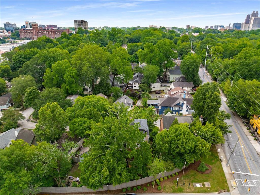 911 Monroe Circle Northeast Atlanta, GA 30308 - Photo 68 of 86 a view of a garden with a building in the background