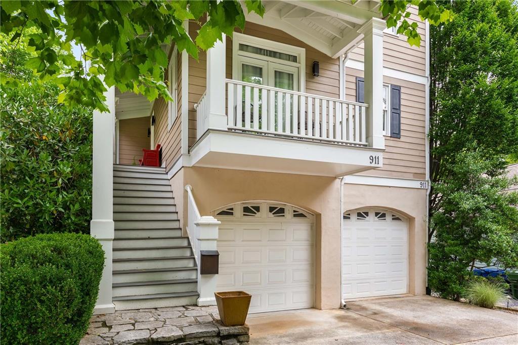 911 Monroe Circle Northeast Atlanta, GA 30308 - Photo 75 of 86 a front view of a house with a yard