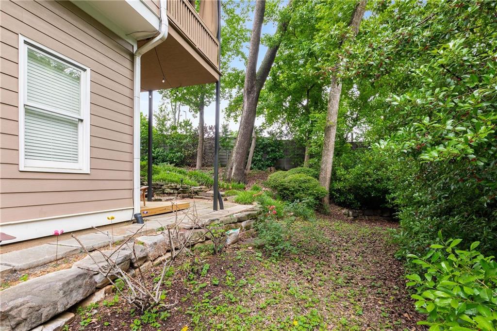 911 Monroe Circle Northeast Atlanta, GA 30308 - Photo 77 of 86 a view of a backyard with garden
