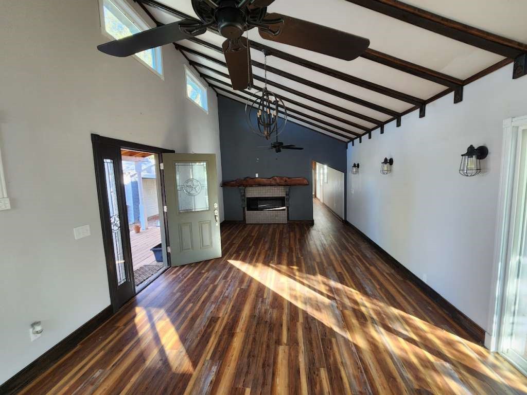 108 East 9th Street Channing, TX 79018 - Photo 2 of 16 a view of a hallway with wooden floor and staircase