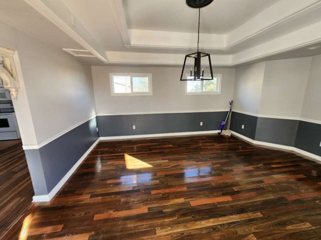 108 East 9th Street Channing, TX 79018 - Photo 6 of 16 a view of a room with window and wooden floor