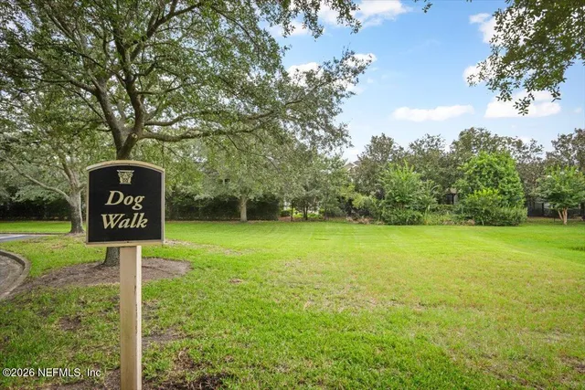 a sign that is on the side of a field