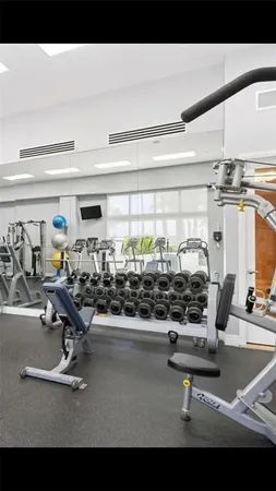 a view of a room with gym equipment