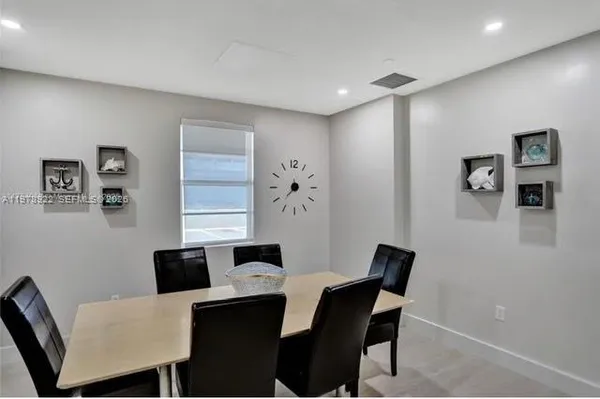 a view of a swimming pool with a yard