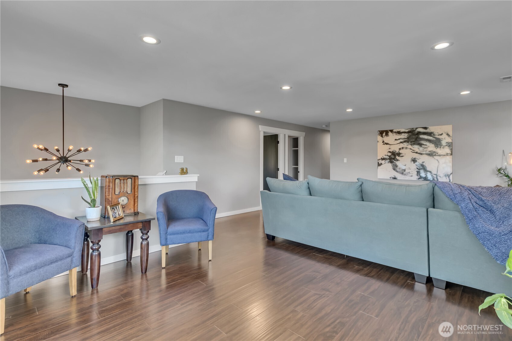 204 5th Avenue Milton, WA 98354 - Photo 19 of 37 a living room with furniture and wooden floor