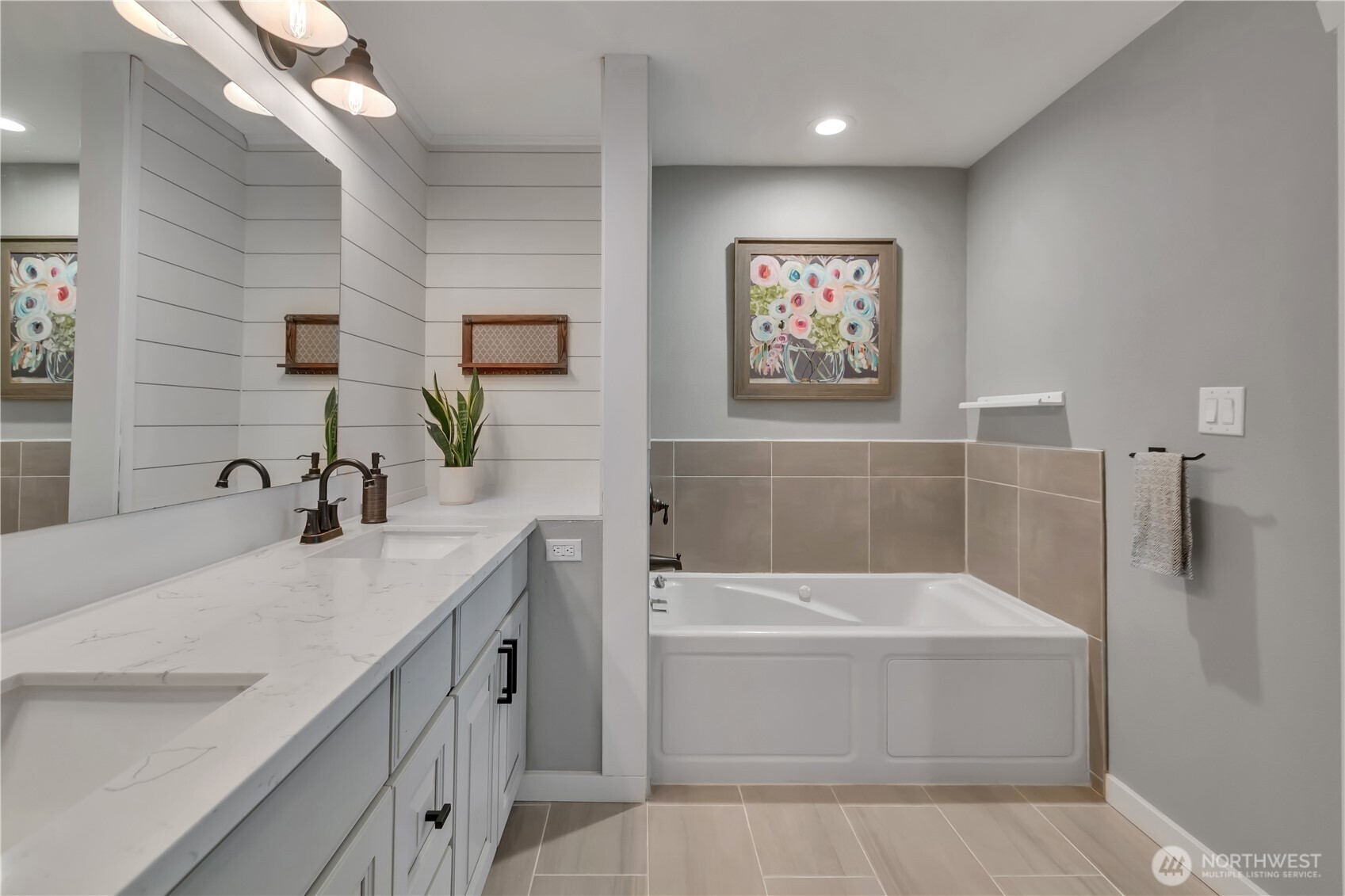 204 5th Avenue Milton, WA 98354 - Photo 26 of 37 a bathroom with a tub a sink and mirror