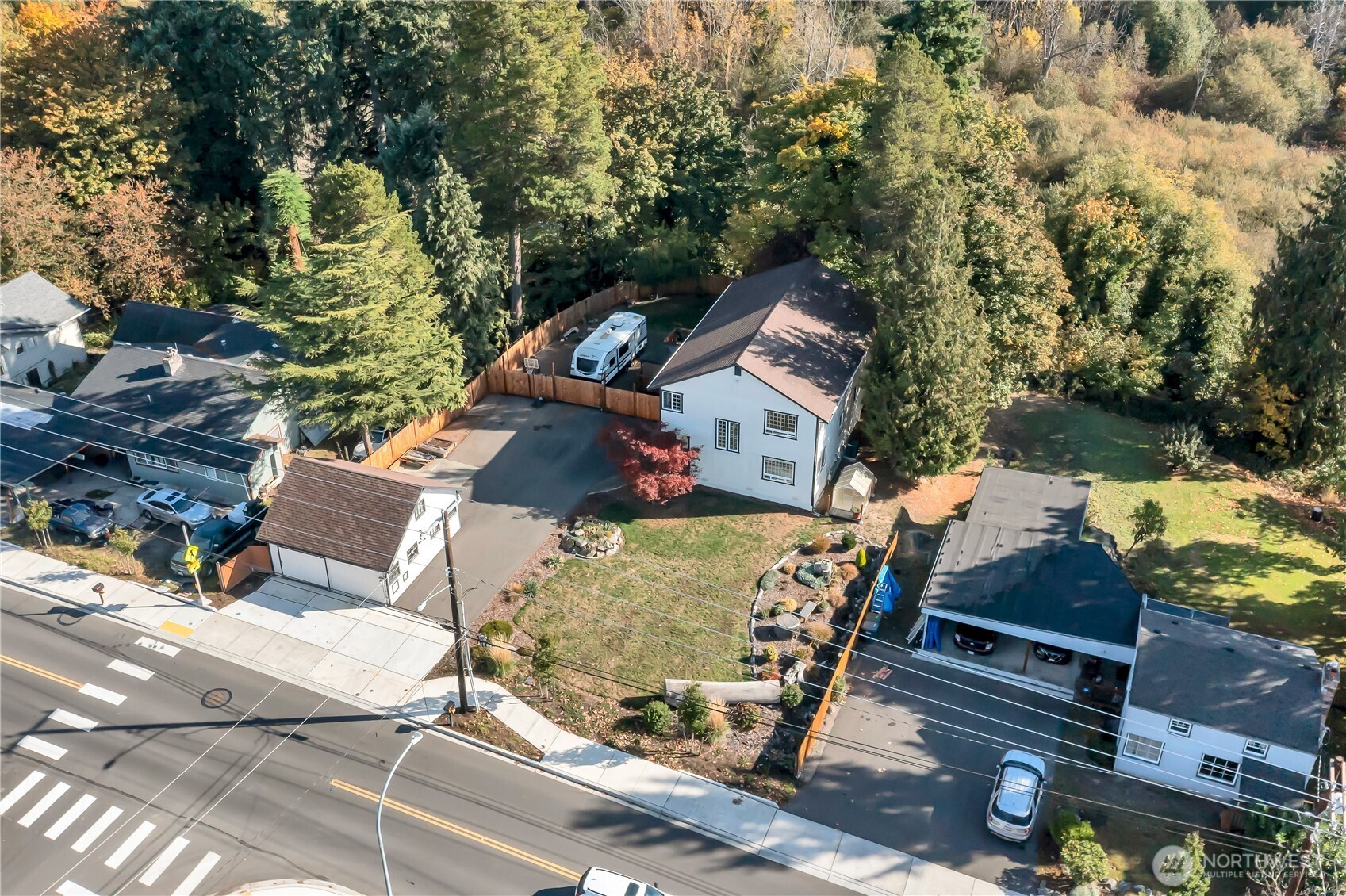 204 5th Avenue Milton, WA 98354 - Photo 35 of 37 an aerial view of a house with a yard and a large tree