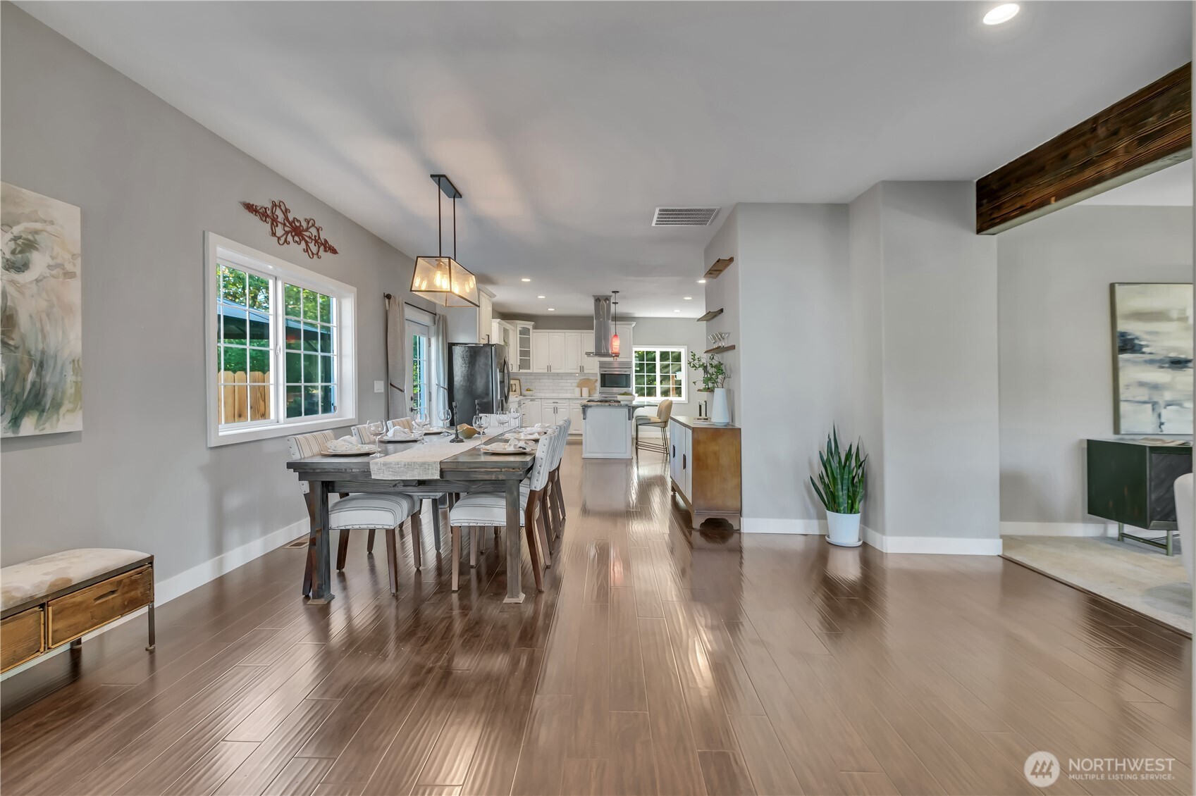 204 5th Avenue Milton, WA 98354 - Photo 5 of 37 a view of a dining room with furniture and wooden floor