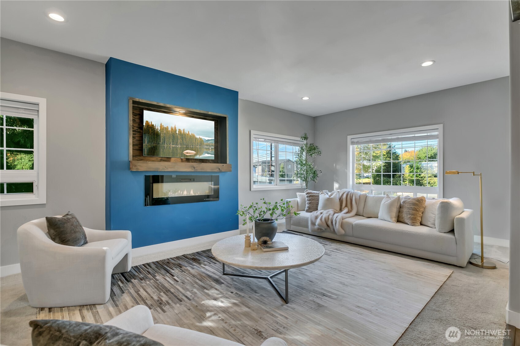 204 5th Avenue Milton, WA 98354 - Photo 8 of 37 a living room with furniture and a large window