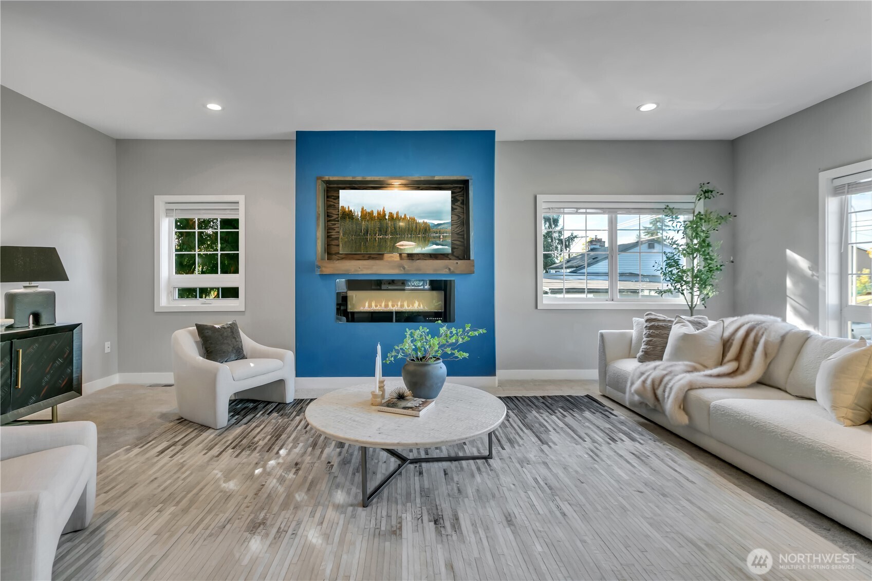 204 5th Avenue Milton, WA 98354 - Photo 9 of 37 a living room with furniture and a flat screen tv