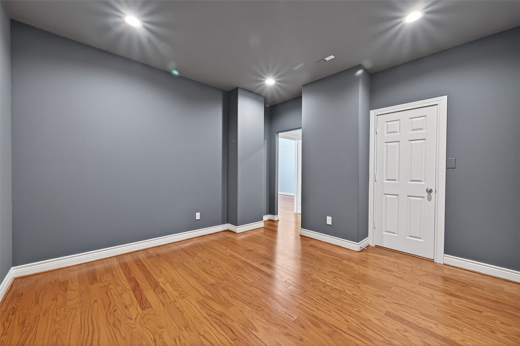 1105 Wagner Street Houston, TX 77007 - Photo 21 of 27 a view of an empty room with wooden floor