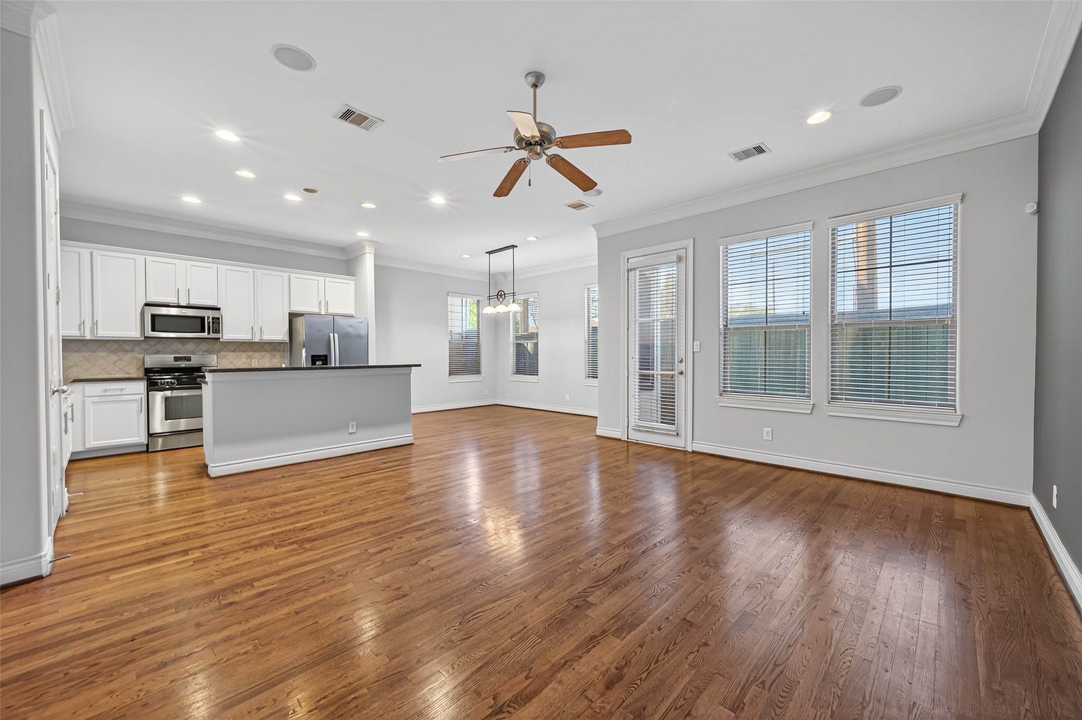 1105 Wagner Street Houston, TX 77007 - Photo 3 of 27 a view of kitchen with cabinets and wooden floor