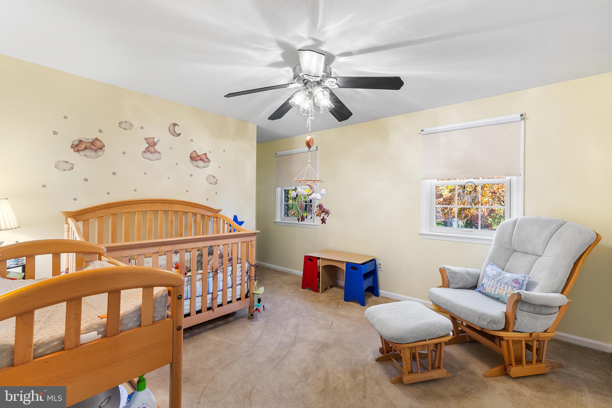 511 Faith Drive Norristown, PA 19403 - Photo 20 of 39 a bedroom with furniture and a chandelier