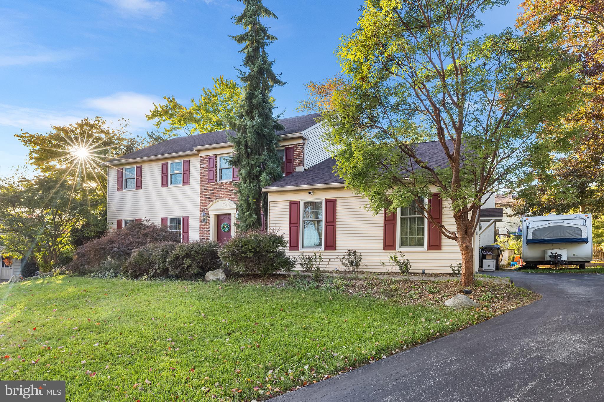 511 Faith Drive Norristown, PA 19403 - Photo 2 of 39 a front view of a house with garden