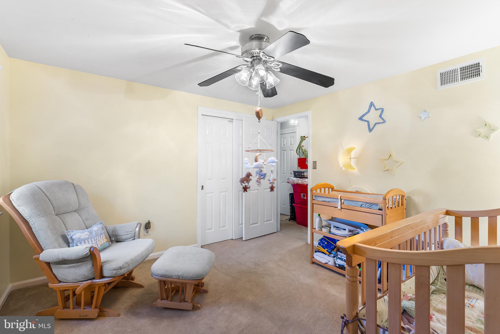 511 Faith Drive Norristown, PA 19403 - Photo 21 of 39 a bedroom with furniture and a chair