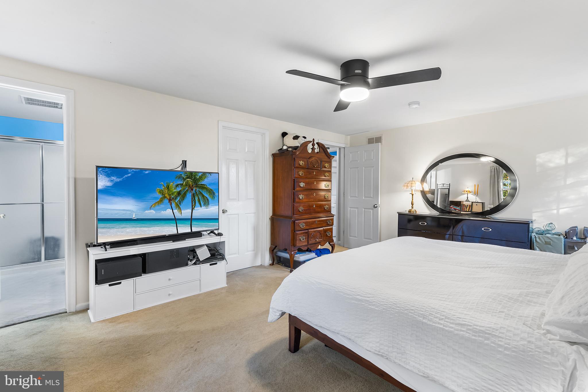 511 Faith Drive Norristown, PA 19403 - Photo 27 of 39 a bedroom with a bed and a flat screen tv