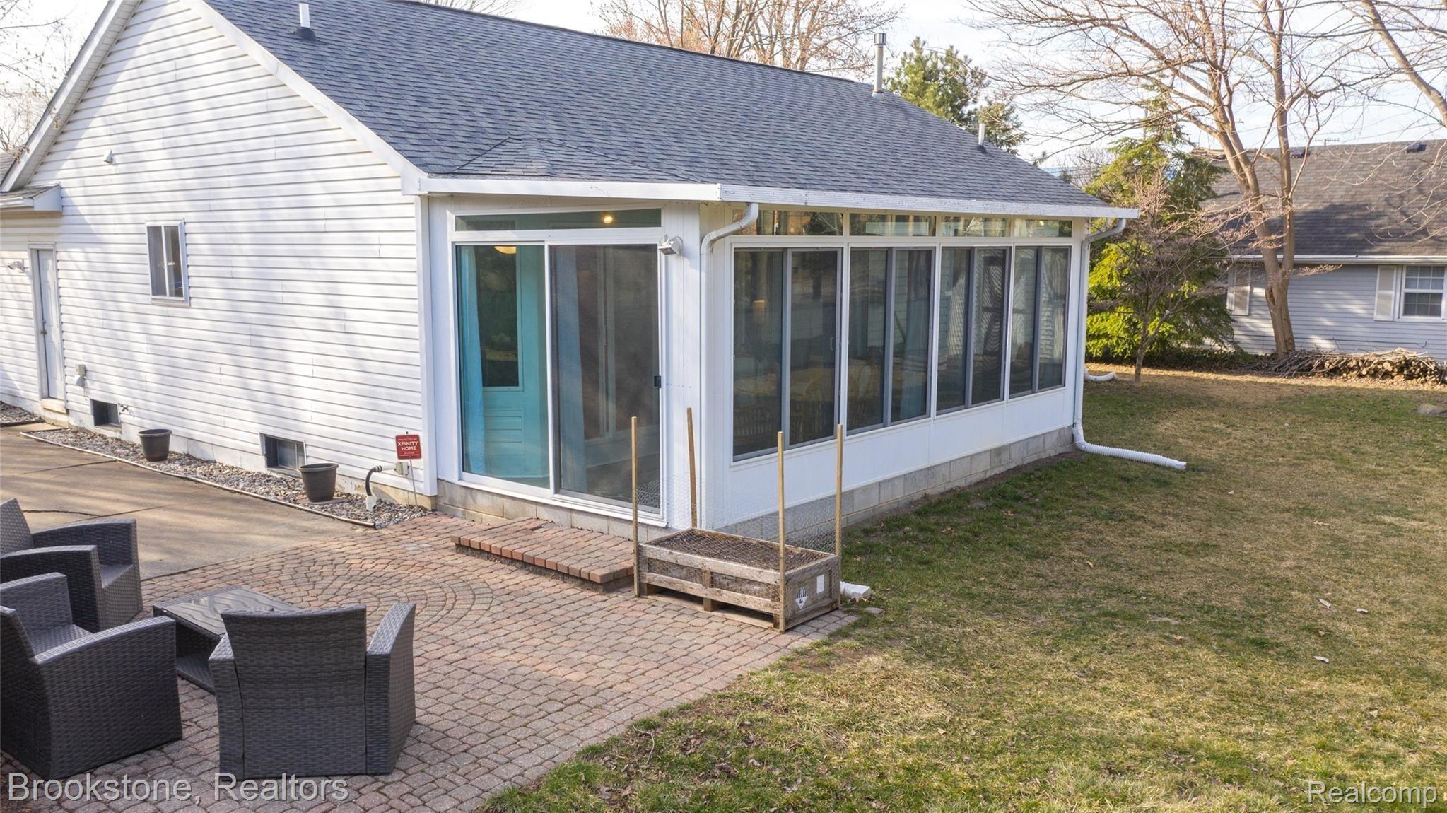 2909 Alexander Street Rochester, MI 48309 - Photo 7 of 27 3 Seasons room goes straight to the brick patio