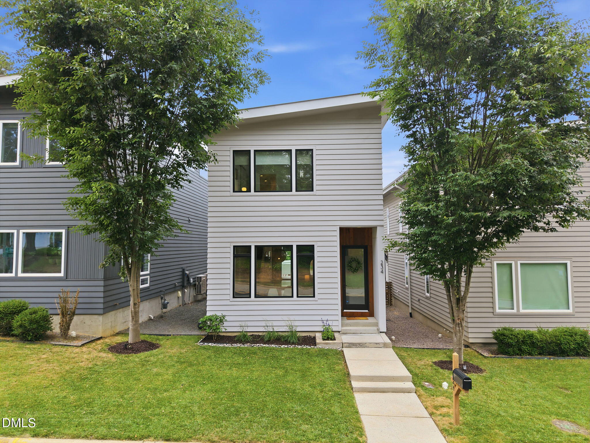 234 Powell Drive Raleigh, NC 27606 - Photo 1 of 46 1-web-or-mls-DJI_20260522143739_0036_D-e