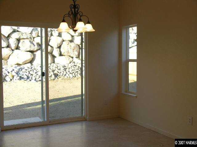 1437 Hagar Road Reno, NV 89506 - Photo 3 of 6 a view of an empty room and window