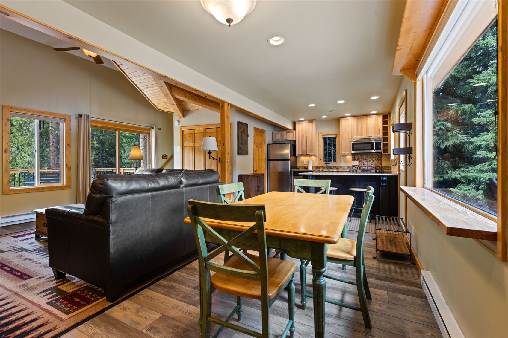 283 Range Road, Unit 4 Breckenridge, CO 80424 - Photo 11 of 32 Dining room with lovely natural light and views.