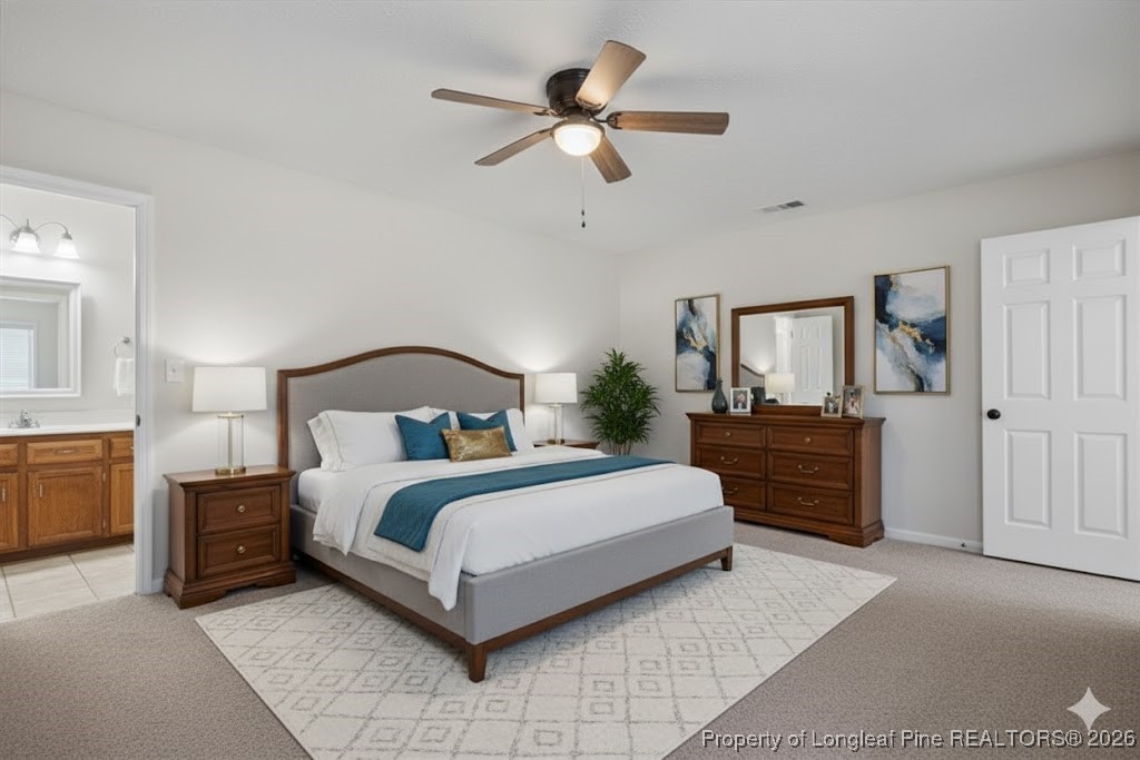 151 Ballard Drive Raeford, NC 28376 - Photo 14 of 34 a spacious bedroom with a bed and dresser