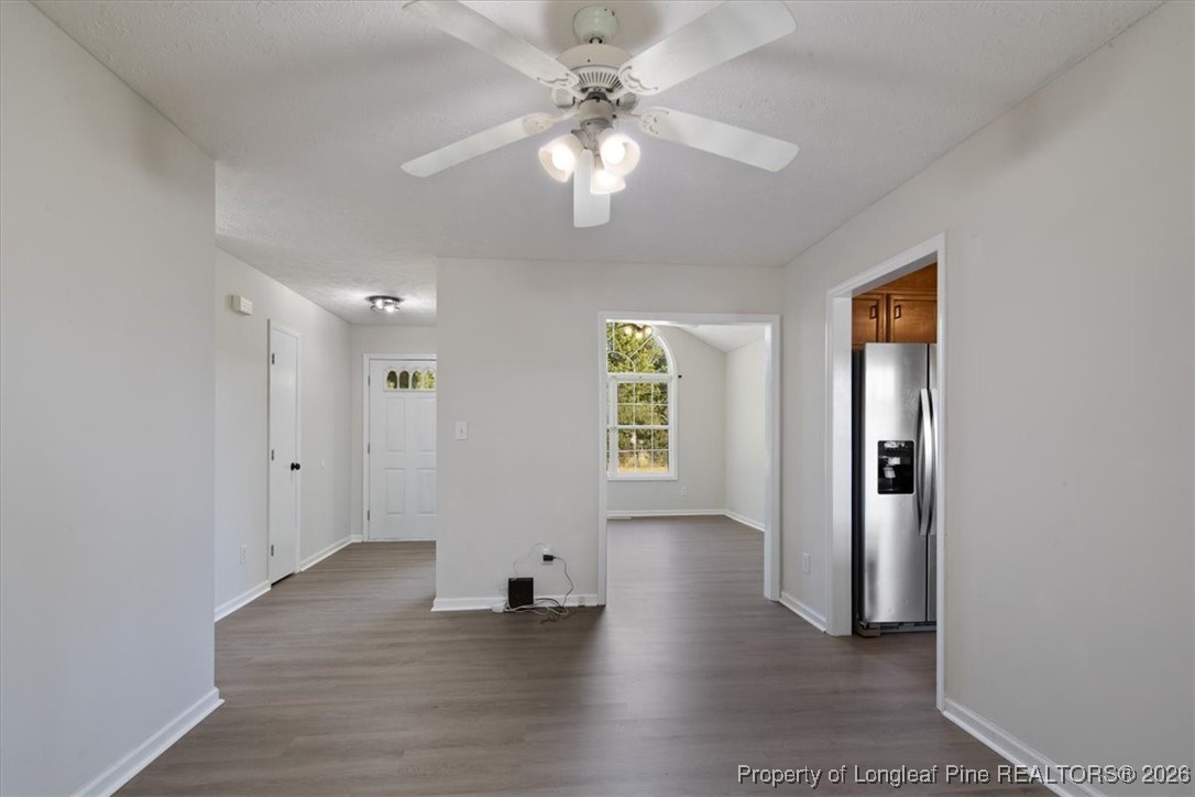 151 Ballard Drive Raeford, NC 28376 - Photo 17 of 34 wooden floor in an empty room with a window