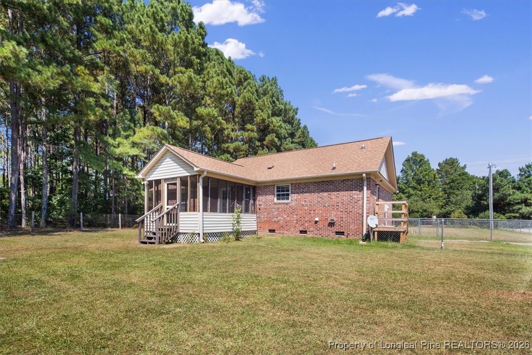 151 Ballard Drive Raeford, NC 28376 - Photo 33 of 34 a front view of a house with garden