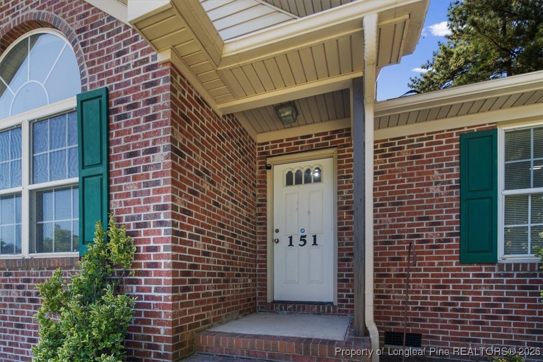 151 Ballard Drive Raeford, NC 28376 - Photo 5 of 34 a door view of a house