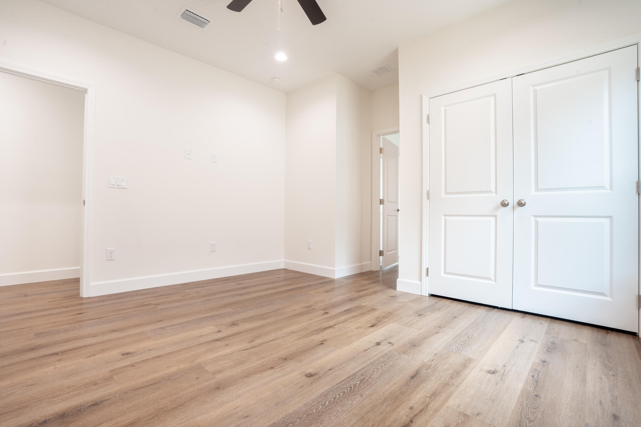 21 B 5th Avenue Shalimar, FL 32579 - Photo 15 of 21 a view of an empty room with wooden floor