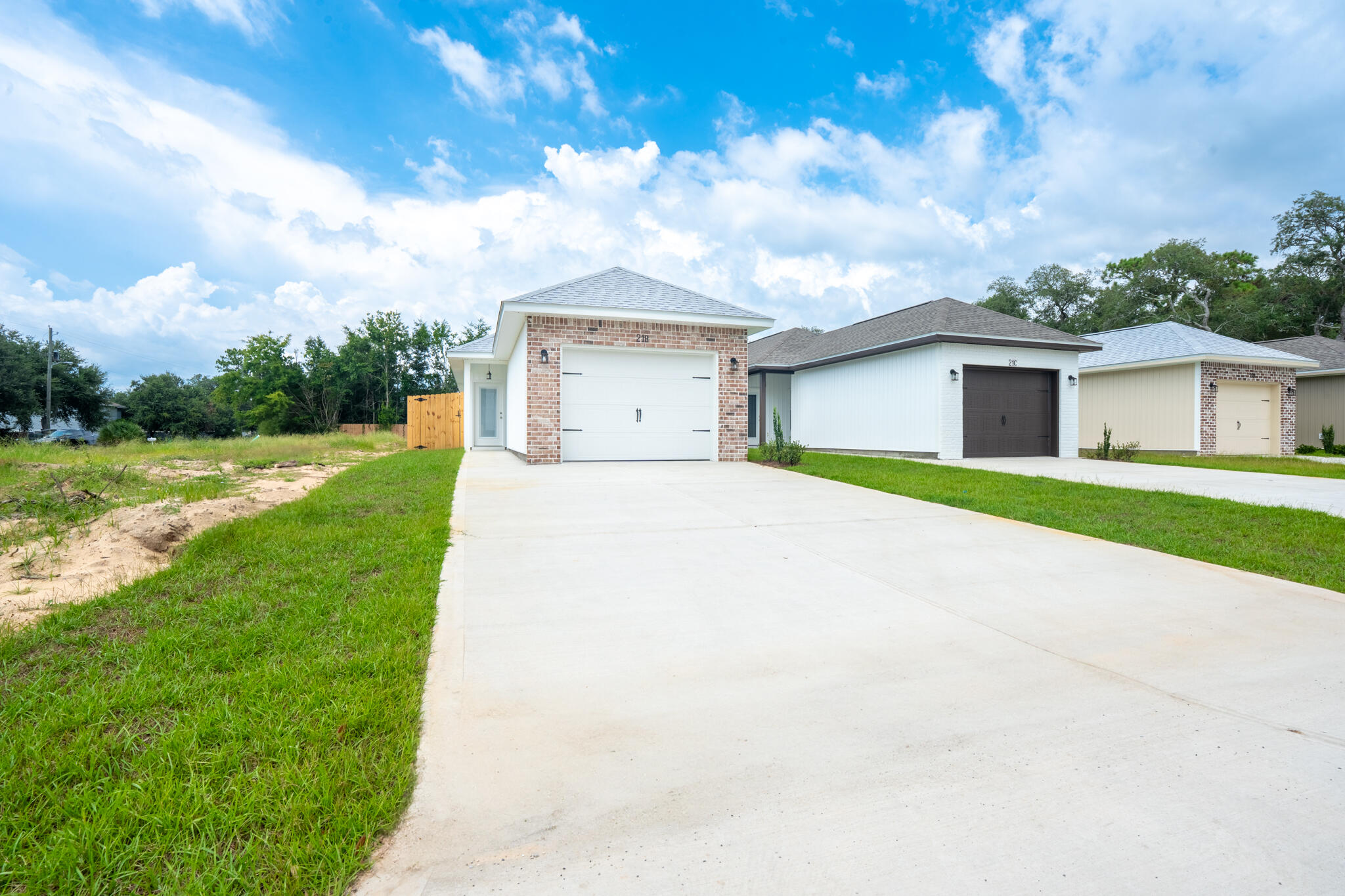 21 B 5th Avenue Shalimar, FL 32579 - Photo 3 of 21 a view of a house with a big yard and potted plants
