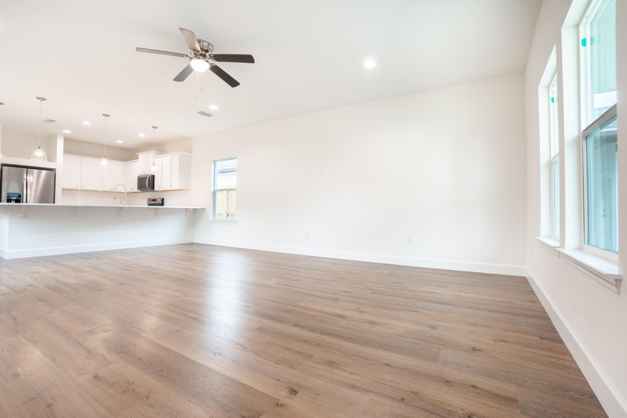 21 B 5th Avenue Shalimar, FL 32579 - Photo 5 of 21 a view of a kitchen with a dishwasher and wooden floor