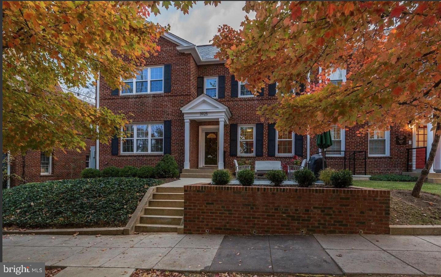 3925 Fulton Street Northwest, Unit 5 Washington, DC 20007 - Photo 2 of 19 a front view of a house with a garden