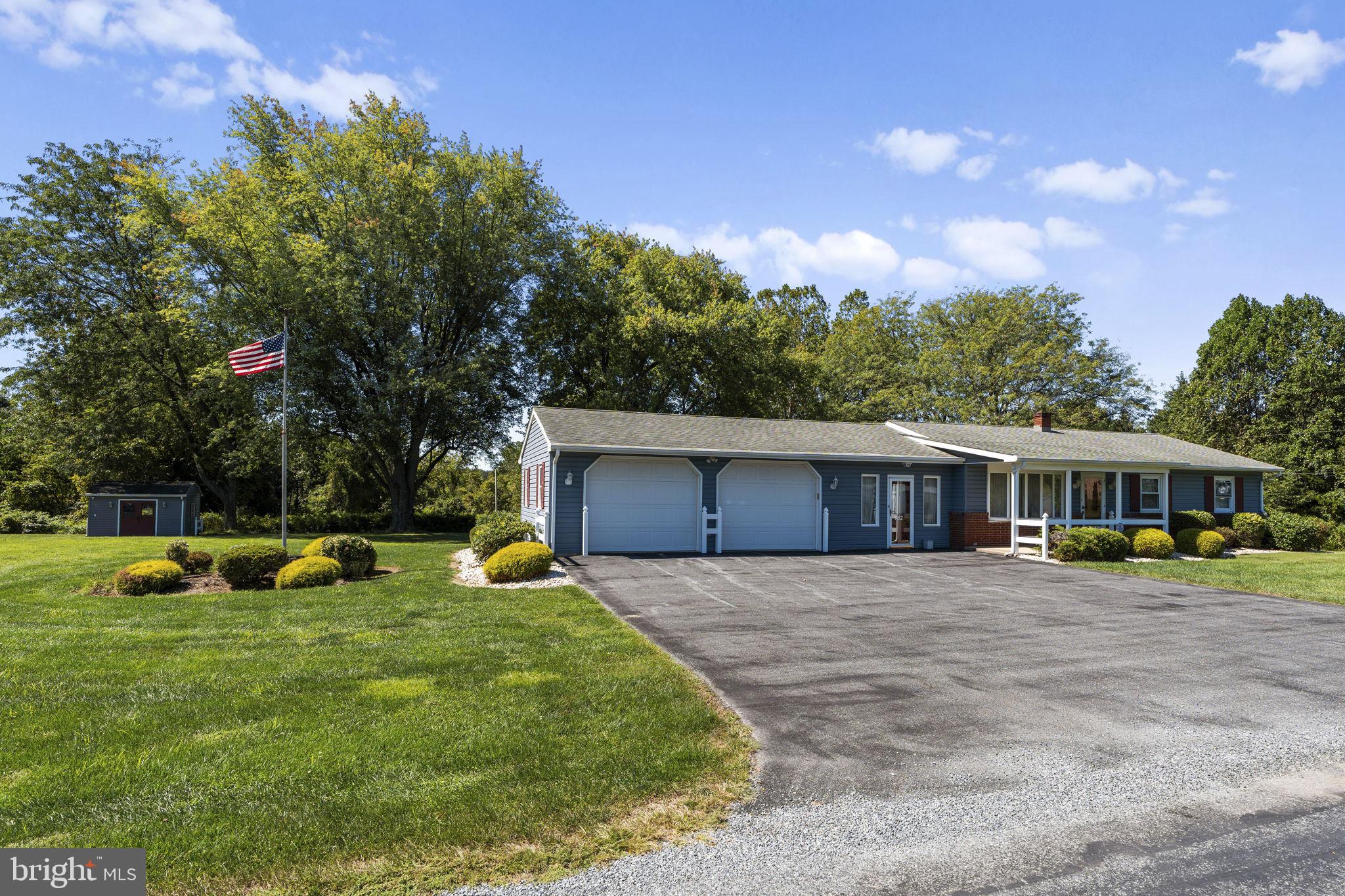 462 Sawmill Road New Providence, PA 17560 - Photo 1 of 26 a front view of a house with garden
