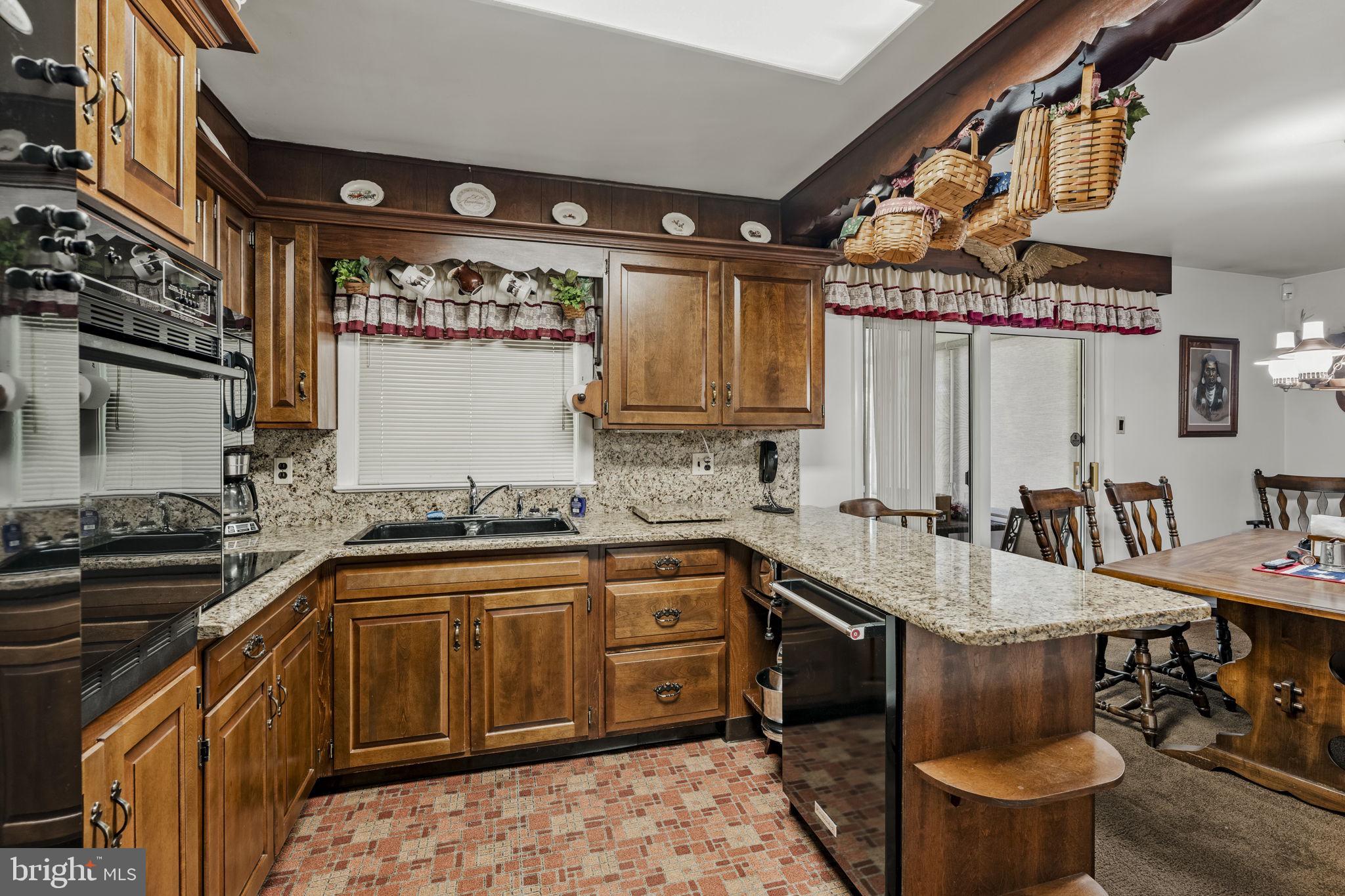 462 Sawmill Road New Providence, PA 17560 - Photo 12 of 26 a kitchen with a sink and cabinets