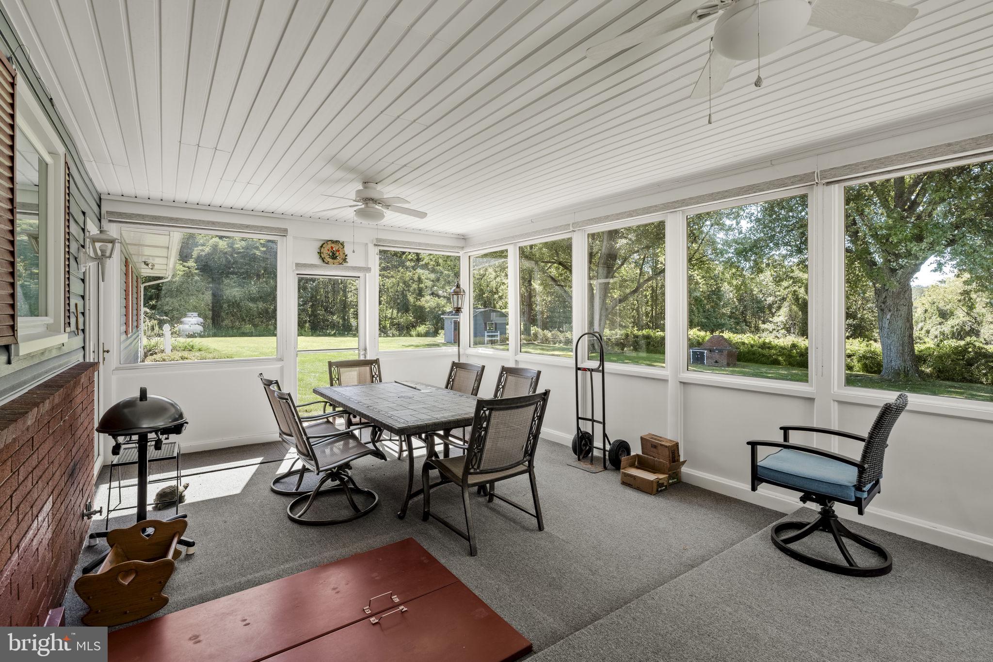 462 Sawmill Road New Providence, PA 17560 - Photo 13 of 26 a view of a dining room with furniture window and outside view