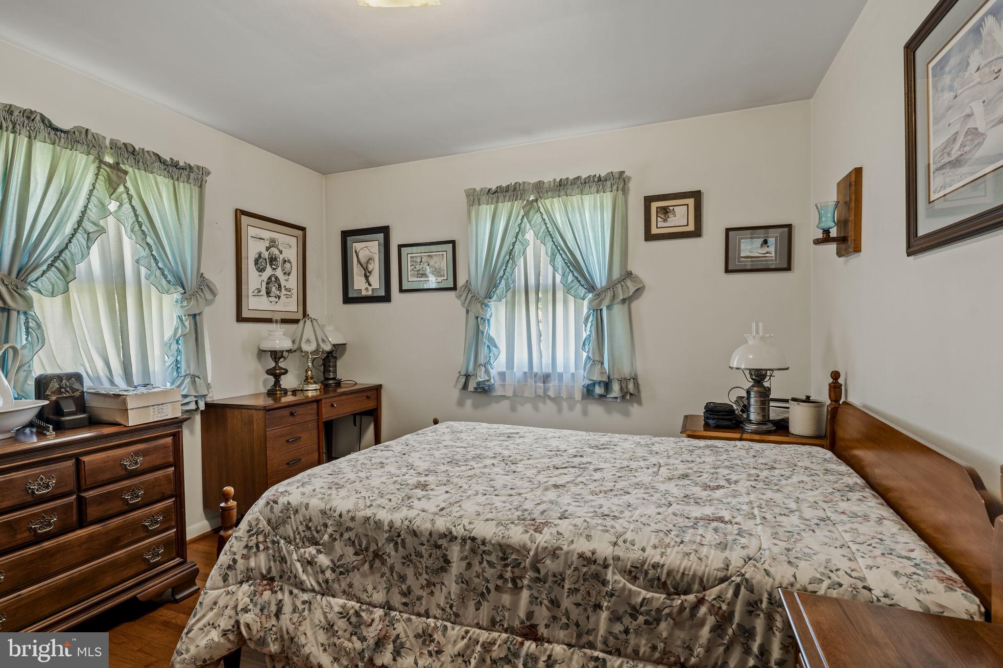 462 Sawmill Road New Providence, PA 17560 - Photo 16 of 26 a bedroom with a bed and a dresser in it